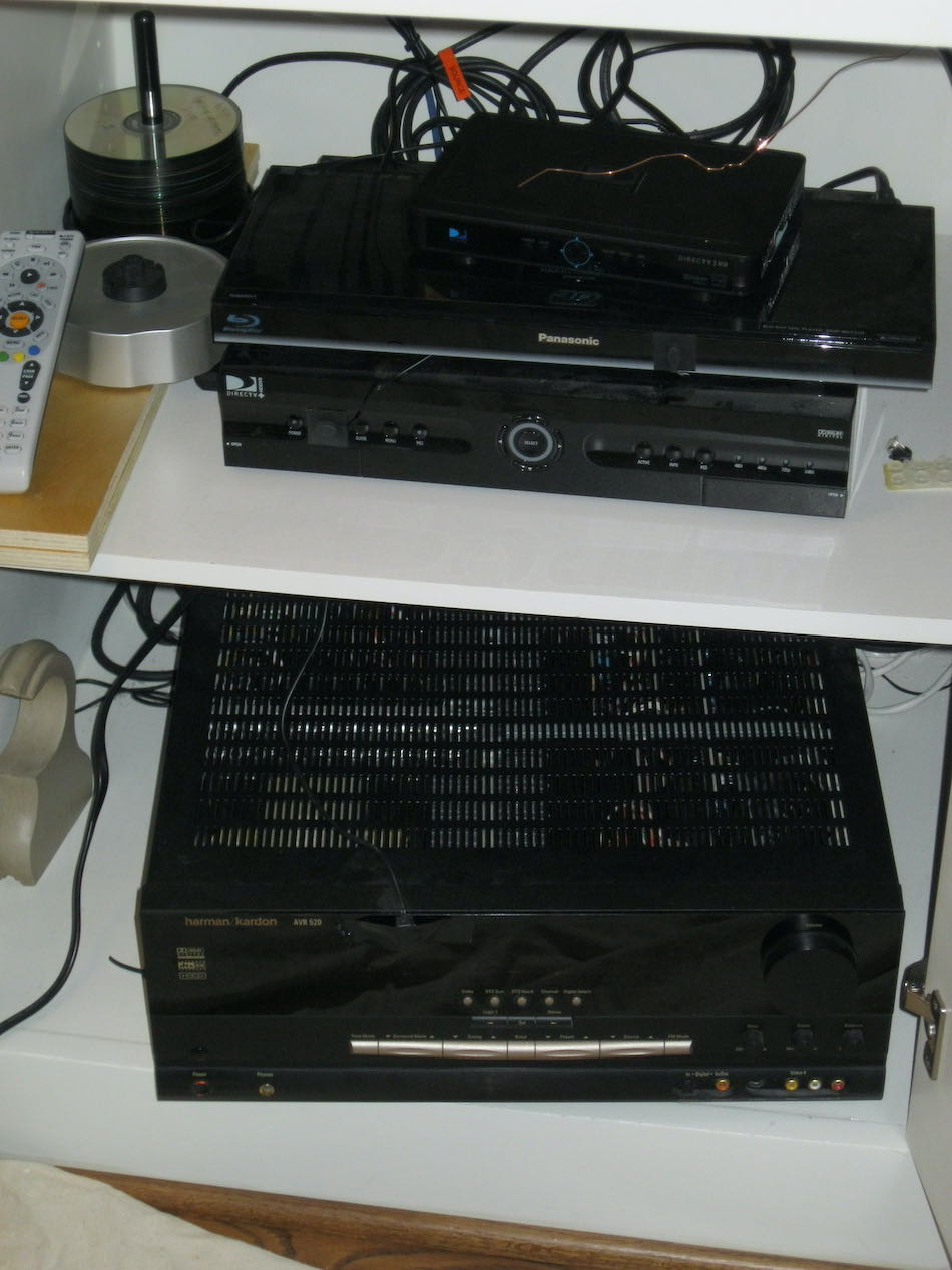 Messy A/V Equipment in Cabinet